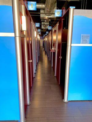 Hallway of 17 tanning rooms.