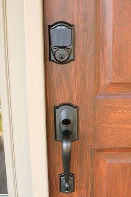 Schlage keypad lock with WiFi and smartphone control with override key.