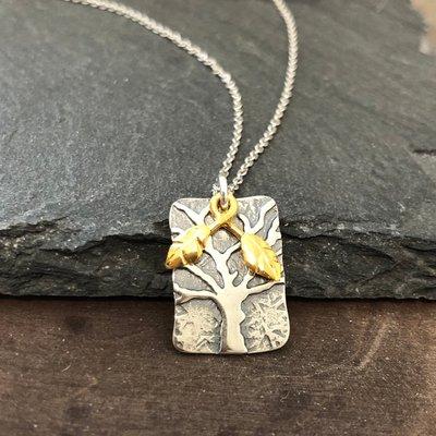 Beautiful Tree pendant with bronze leaves that dangle in sterling silver