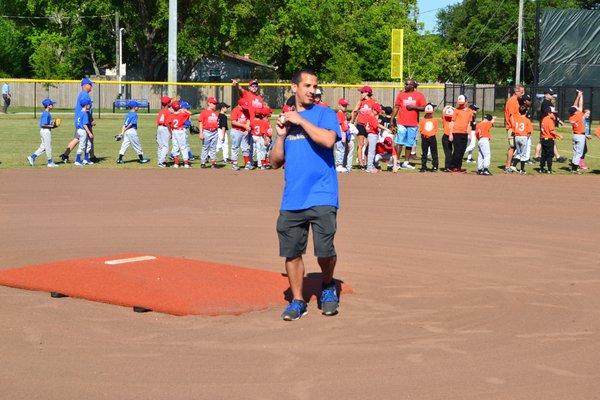 Our BDC Manager throwing out the first pitch for the very first baseball/softball season at Preston Hood Sporting Complex