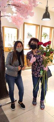 Sara Dubon on the (left) and me with the beautiful long stem  Rose's my husband bought me. "Just Because "