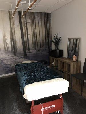 Massage room with overhead ashiatsu bars.