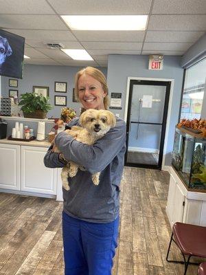 Here is Dr. Cromal holding Roxi at her last appointment with all of the staples, sutures and splint removed. She is one miracle pup!