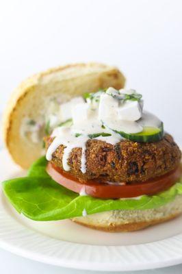 Greek Burger: lettuce, tomato, tzatziki, sliced cucumber, vegan 'feta'