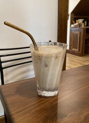 Iced chai latte with a metal straw!