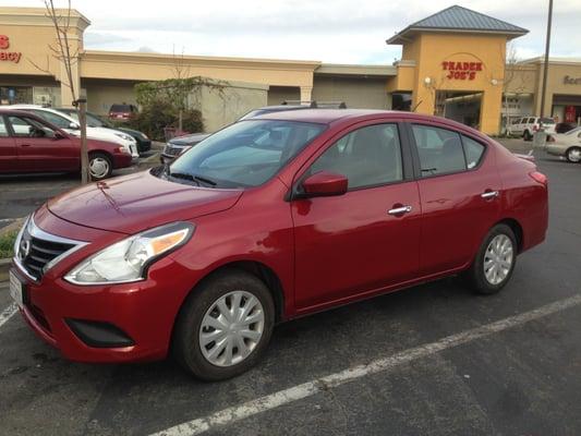 The beautiful brand new Nissan Versa I received. I got a free upgrade!