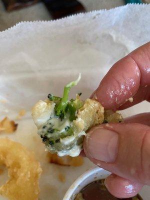 Undercooked tempura vegetables. Wet batter!