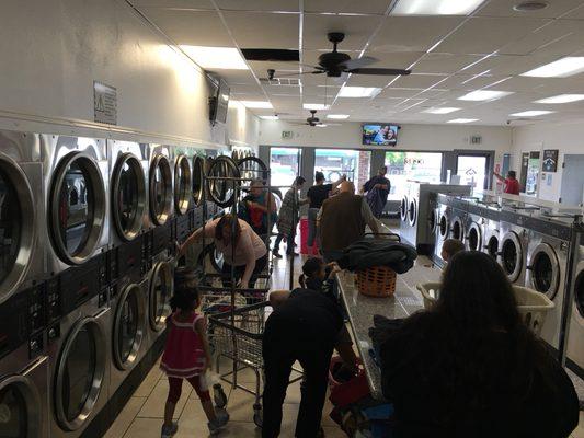 People enjoying Joy laundry!