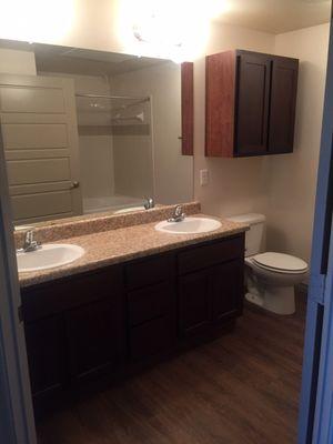 Bathroom with garden tub and counter had two sinks. There is also a medicine cabinet on the left side of the wall (not shown in picture)