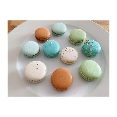 A plated variety of macarons - please ask us what flavors we have available!