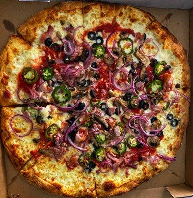 Large - 16 inch: ham, olives, mushrooms, jalapeños and onions. One of the best pizzas I have ever had.