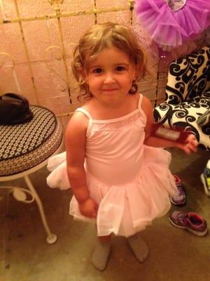 Our 3 year old in the dressing room.  Lots of fun picking out a tutu.