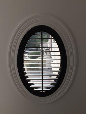 * 2 1/2 inch louvered * Oval basswood shutter * Custom black lacquer