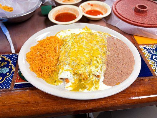 3 Chicken Enchiladas w/ green sauce & sour cream. ($13 ish)