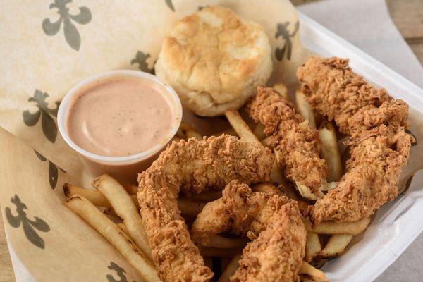 Our Famous Chicken Basket:
 4 Chicken Tenders,
 Fries,
 Cajun Sauce,
 Biscuit