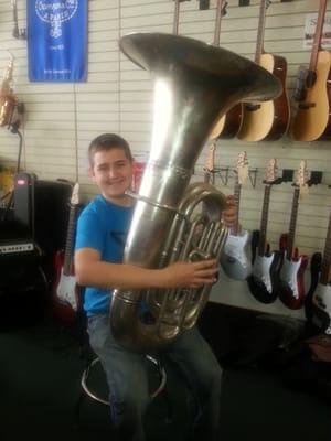 One happy kid with his beautiful vintage tuba.