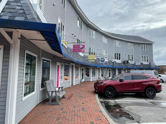 Section of the Large shopping Plaza it is in. Walking distance to Narragansett beach and the Towers.