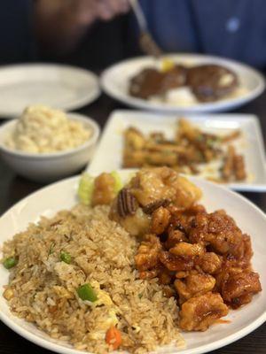 Fried rice, orange chicken, and honey walnut shrimp plate