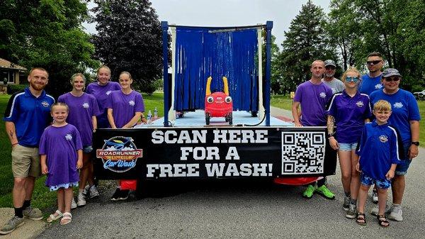 Roadrunner Express Car Wash & Oil Change participating in a local parade