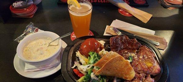 16 Oz ribeye with mashed potato and mixed veggies.