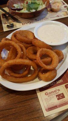 Battered onion rings with chipotle ranch appetizer.