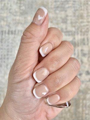 French manicure with heart accents