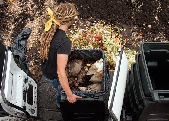 Unloading food scraps to be composted.