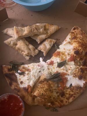 Pizza was amazing but the cinnamon sticks are just raw dough