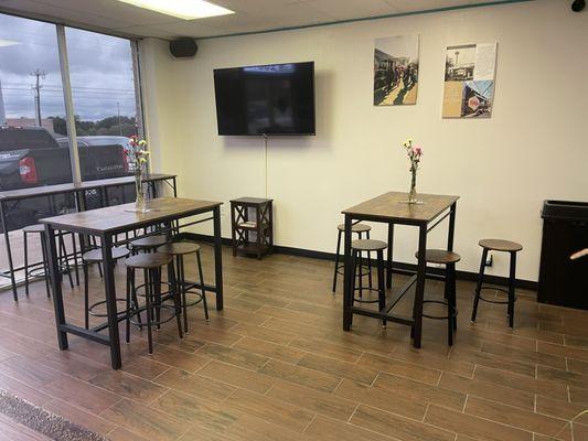 Seating area. Coffee beans in epoxy in the floor. How cool is that.