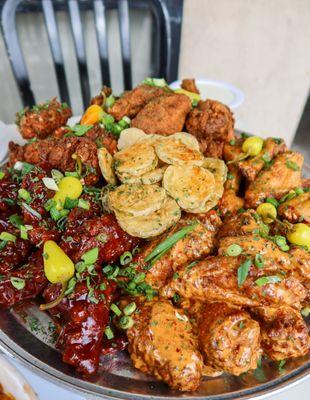 wing platter with fried pickles.