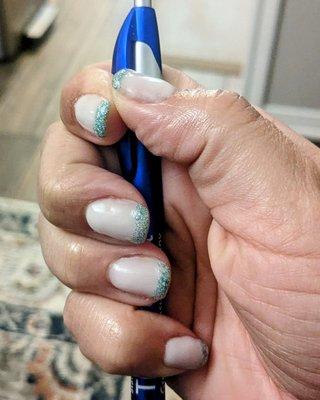 Nails using 2 of the dip powders purchased at Beauty Depot. They adhered well, even after doing dishes every day.