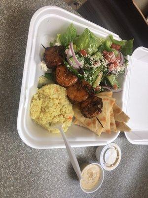 Shrimp platter with side salad and rice