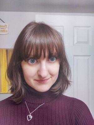 Full bangs! Not too thick or heavy, but not too thin. They balance my face perfectly!! There are still a little damp here