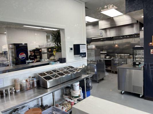 Very clean kitchen visible to the customer