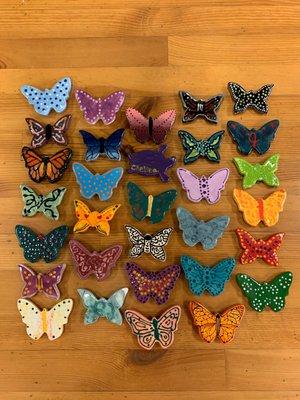 Hand built clay butterfly magnets.