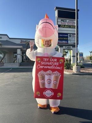 Employee wearing unicorn costume. Very friendly and happy.