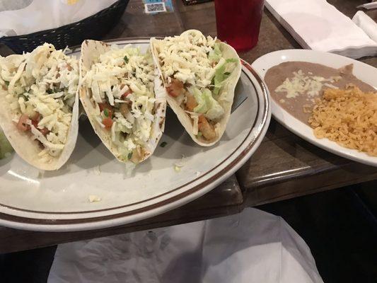 Shrimp tacos with rice and beans