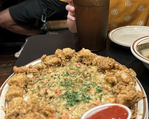 Half and half gator bites and etouffee.