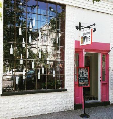 Floating bottle and old time glass window display.