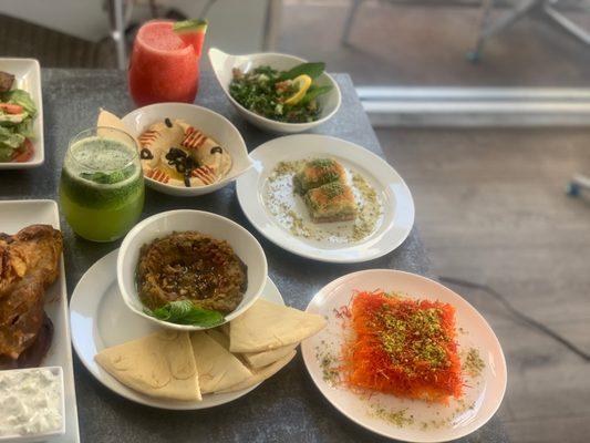 Fresh lemon mint, watermelon juice, kunafa, hummus, baklava and tabouleh.