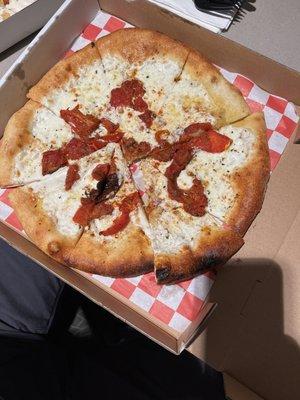 Tomato skin pizza masquerading as margarita pizza. Where's the basil?