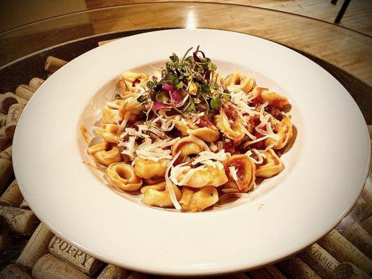 Beef Italian sausage pasta with Swiss cheese