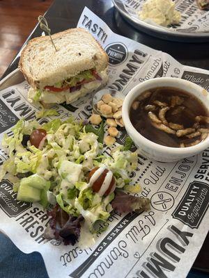 1/2 soup and sandwich with a side salad. French onion (soup of the day) with a deviled egg sandwich and house salad with house dressing.