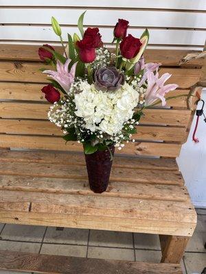 Long stem red roses w lilies succulent