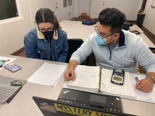 Our awesome tutor Jonathan helping his student prepare for her finals!