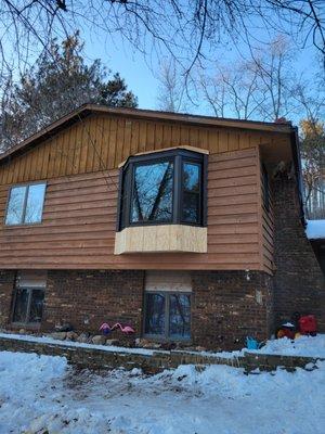 Installed bay window before staining and roof finish