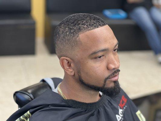 Mid Skin fade with beard line.