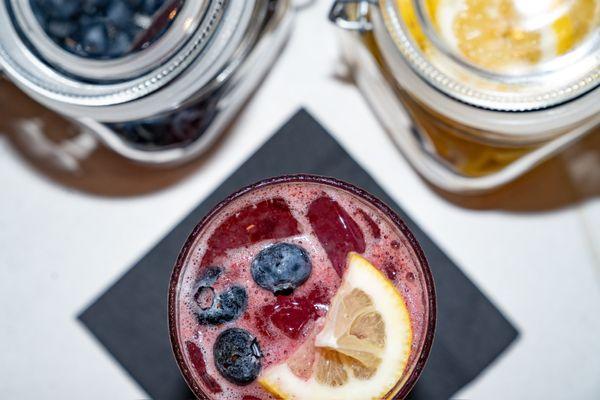 NC Blueberry Lemonade cocktail made with Stoli Blueberry Vodka, House-Made Lemonade and fresh Blueberries