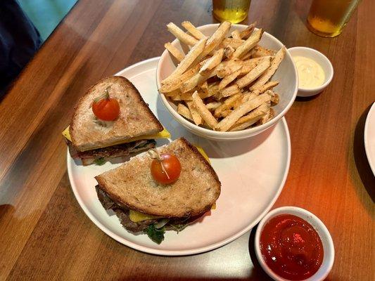 Steak Sandwich - filet mignon, cheddar, spinach, caramelized onion, on sourdough w/ fries