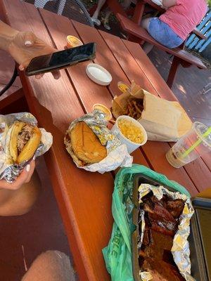 Ribs, pulled pork sandwich Mac and cheese fries